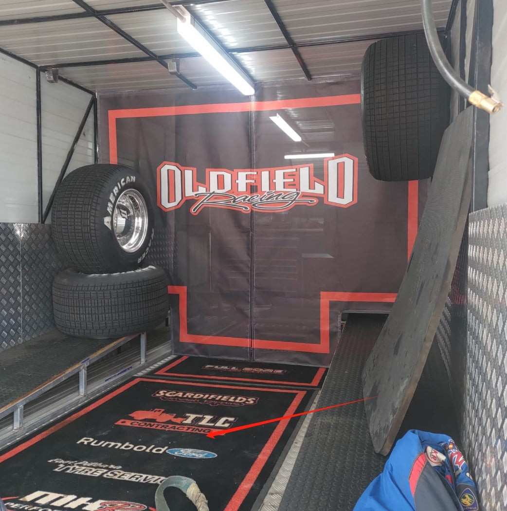 Oldfield Racing trailer interior with American Racer tires displayed – featured by Devil Race Parts